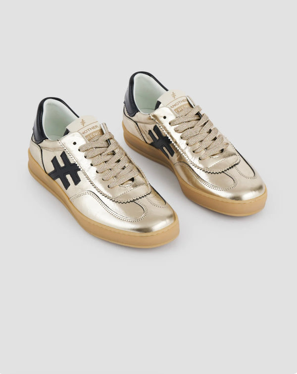 Another Trend Metallic Gold & Black Gum Sole Trainers