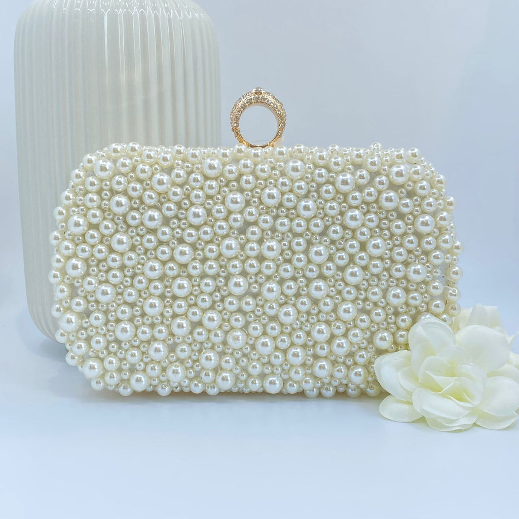 Ivory Pearl Clutch With Gold Diamante Ring